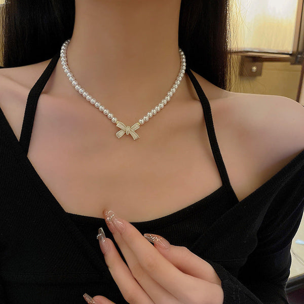 Gold Bow Pearl Necklace